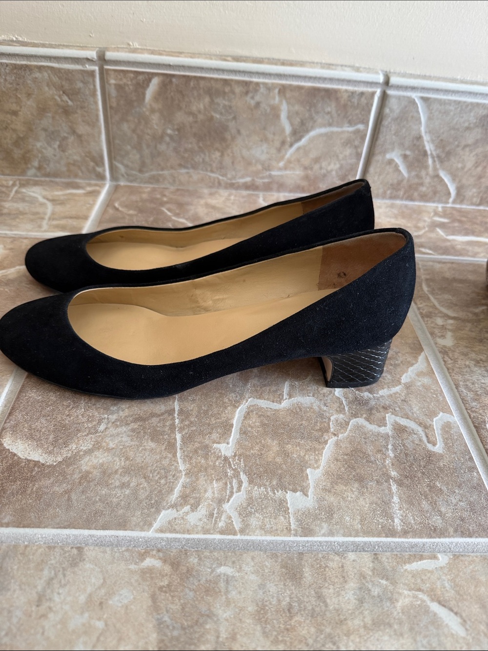 Black suede pumps